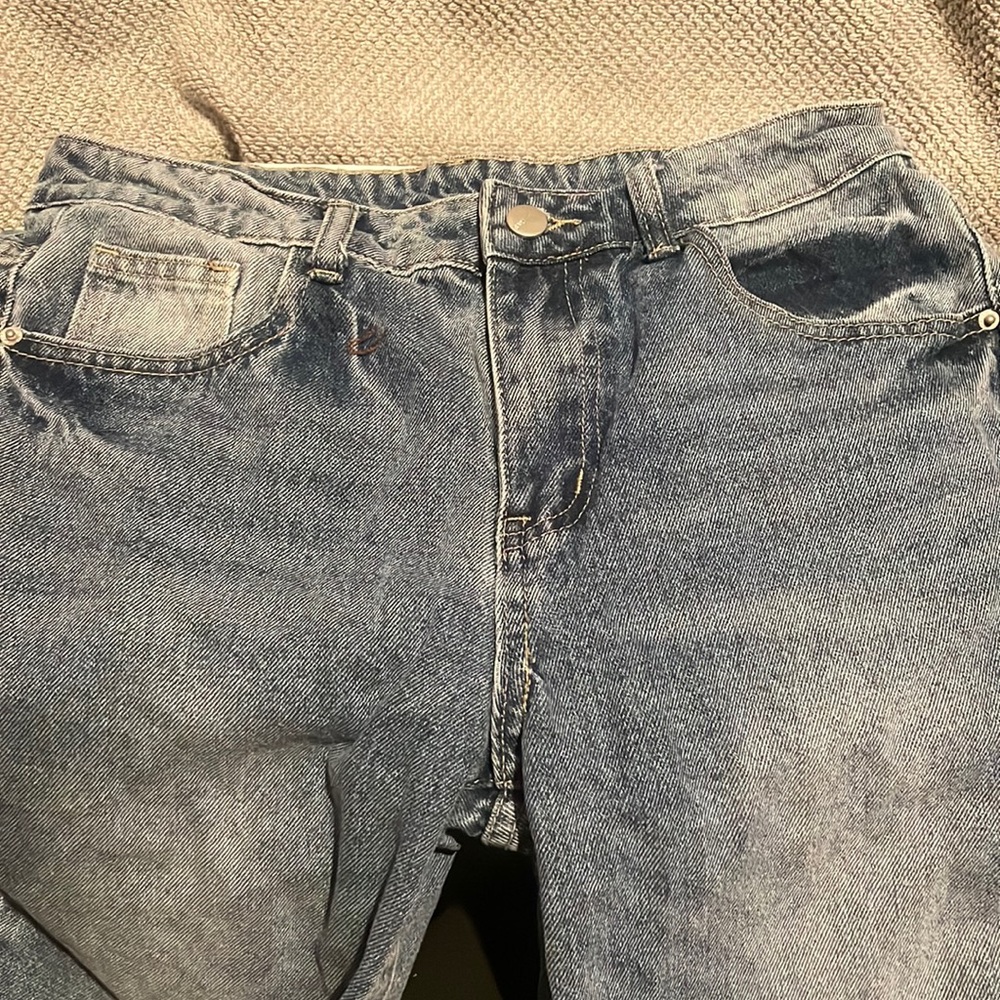 2pairs of jeans together